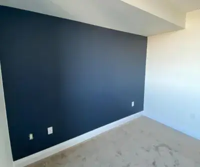 Detail of freshly painted condo trim and walls